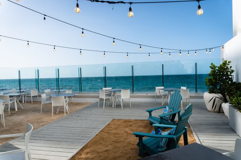 Our SANDBOX LOUNGE offers comfortable outdoor seating around our very own sandbox.